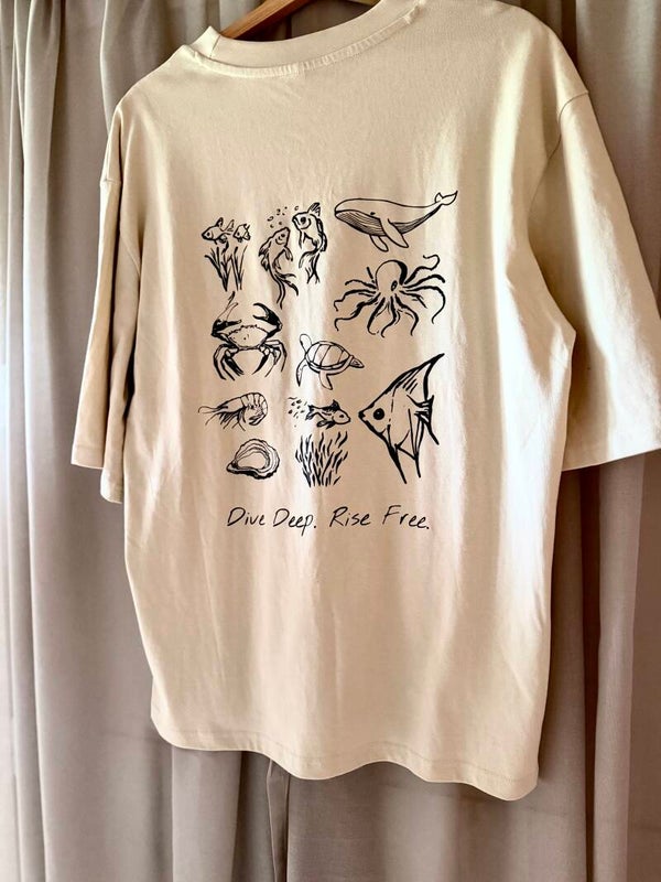 Unisex T-Shirt, Oversize Schnitt, "Dive Deep. Rise Free."