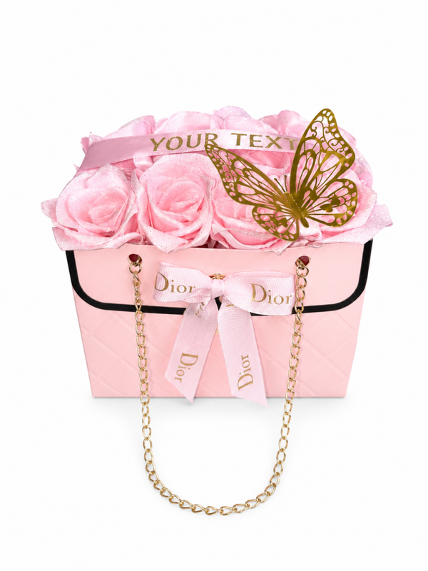 Roze rozen in ene roze tasje