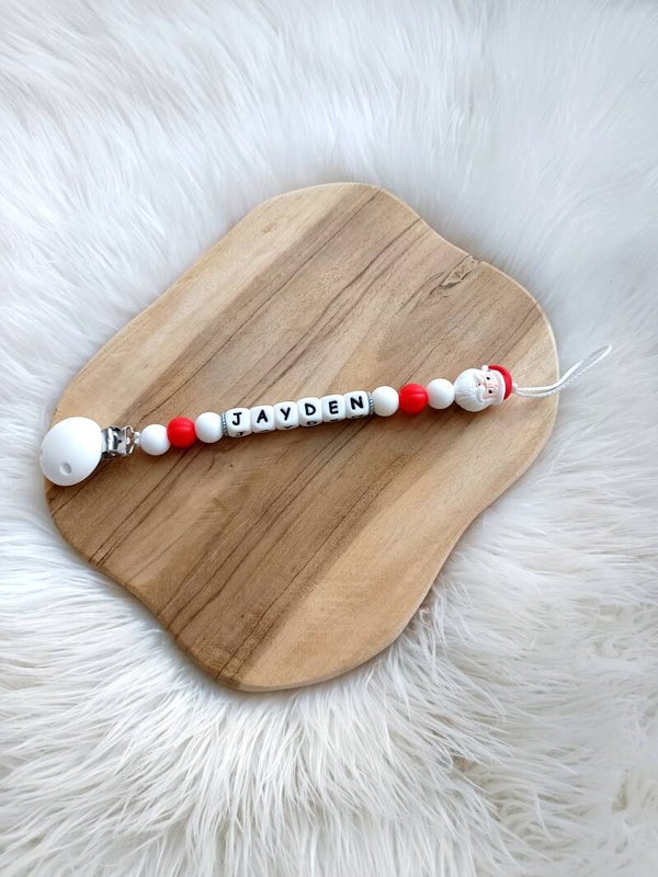 Attache tétine tête père noël