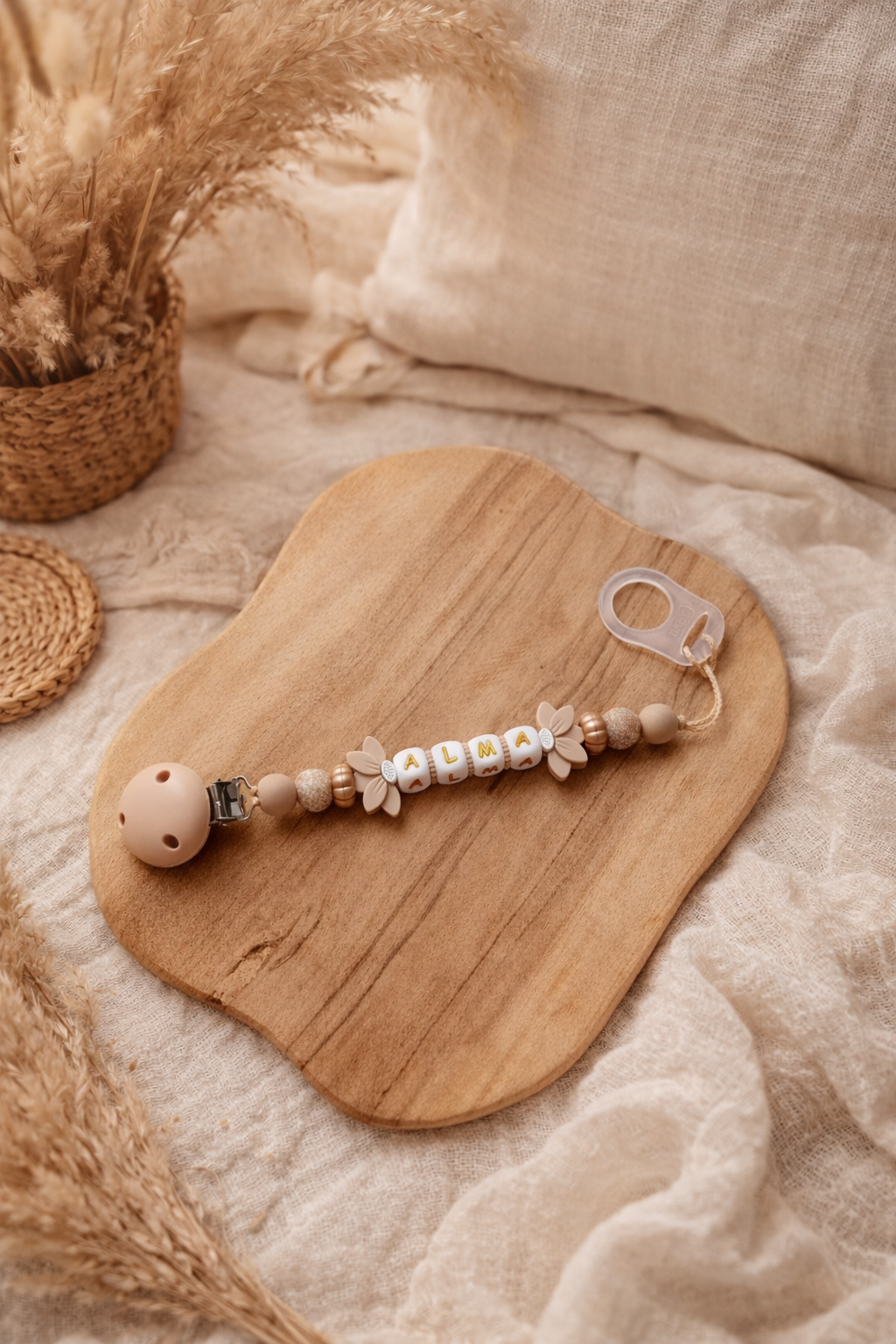 Attache tétine fleurs de lotus