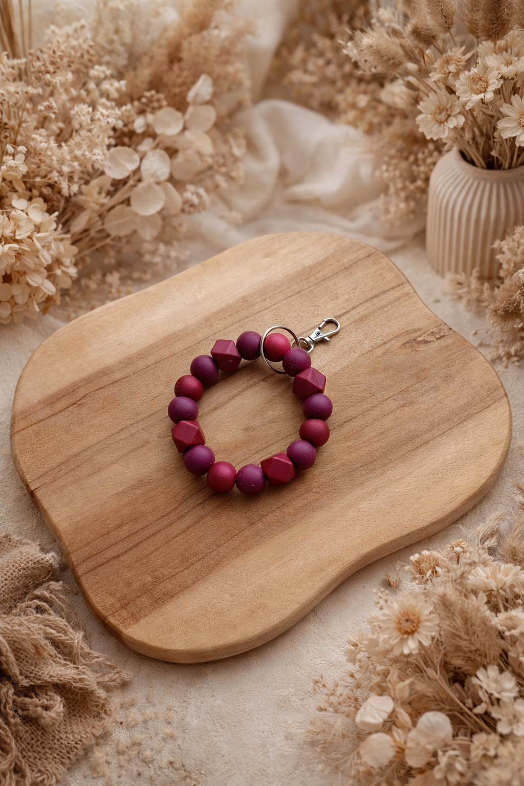 Porte clé rond aubergine