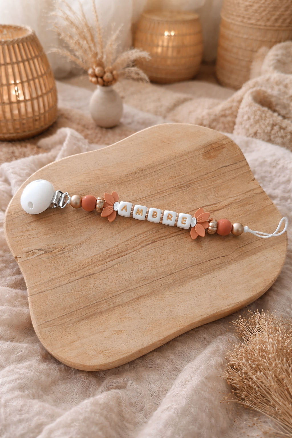 Attache tétine fleurs de lotus