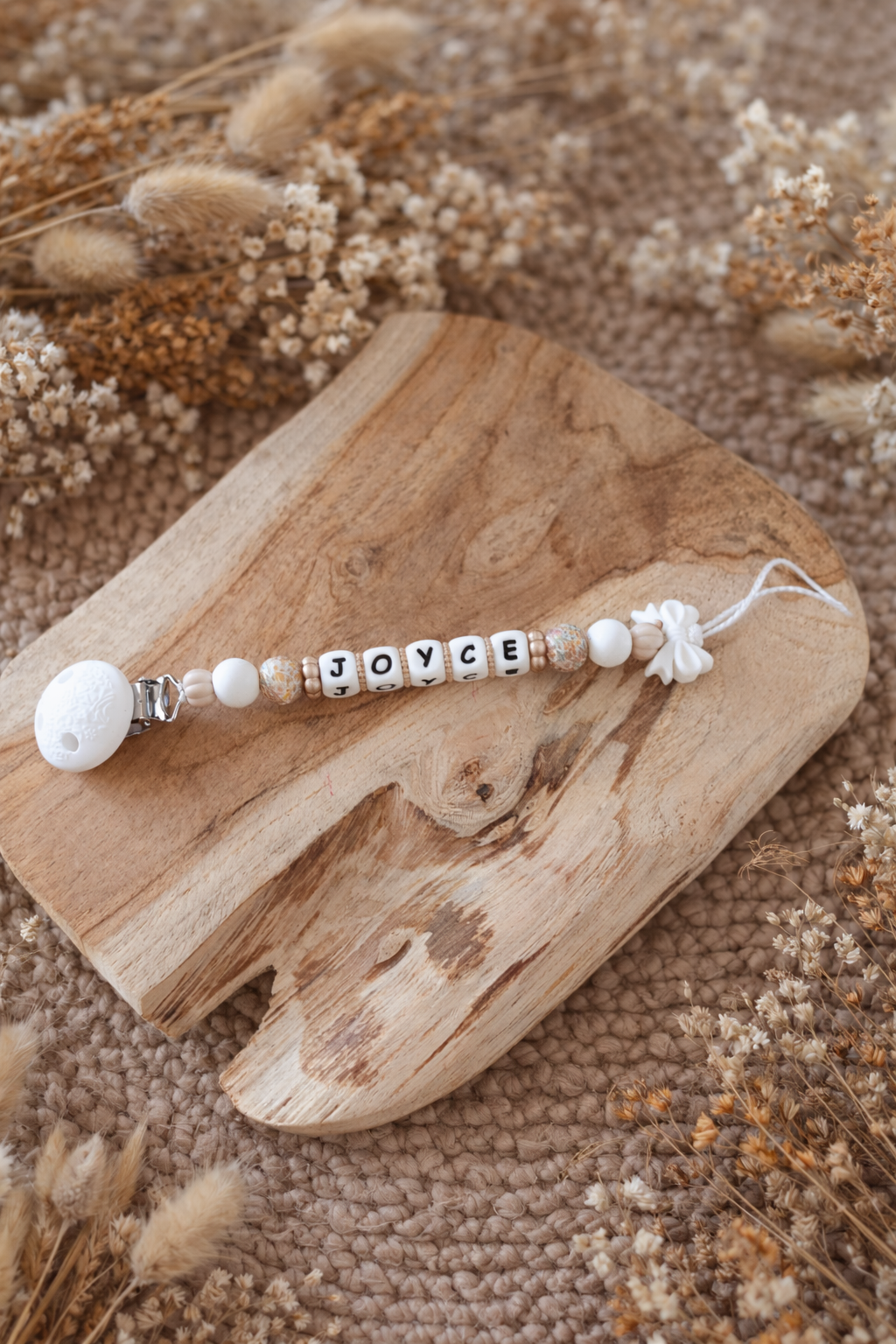 Attache tétine nœud ‹ Joyce ›