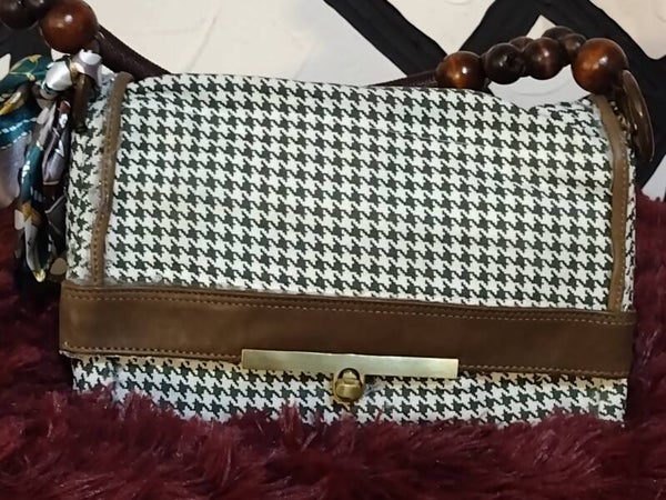 checkered print clutch