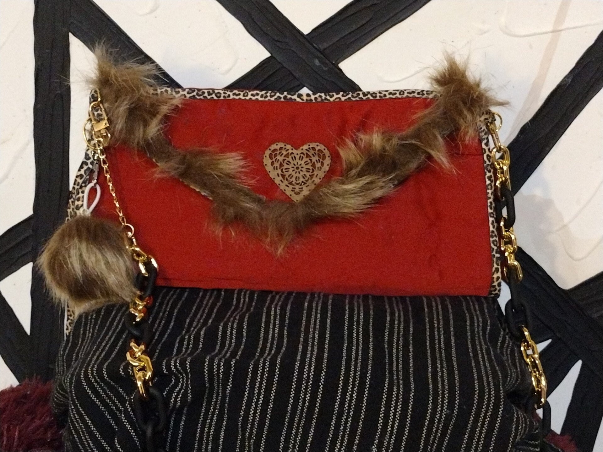 Red stylish clutch with fur