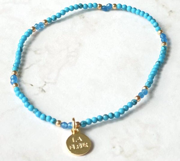 Turquoise mee zeeblauw en goud