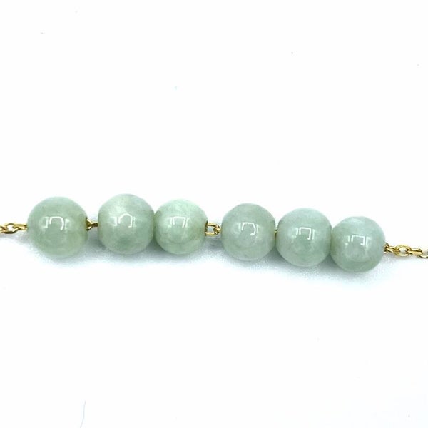 Goud met groene jade