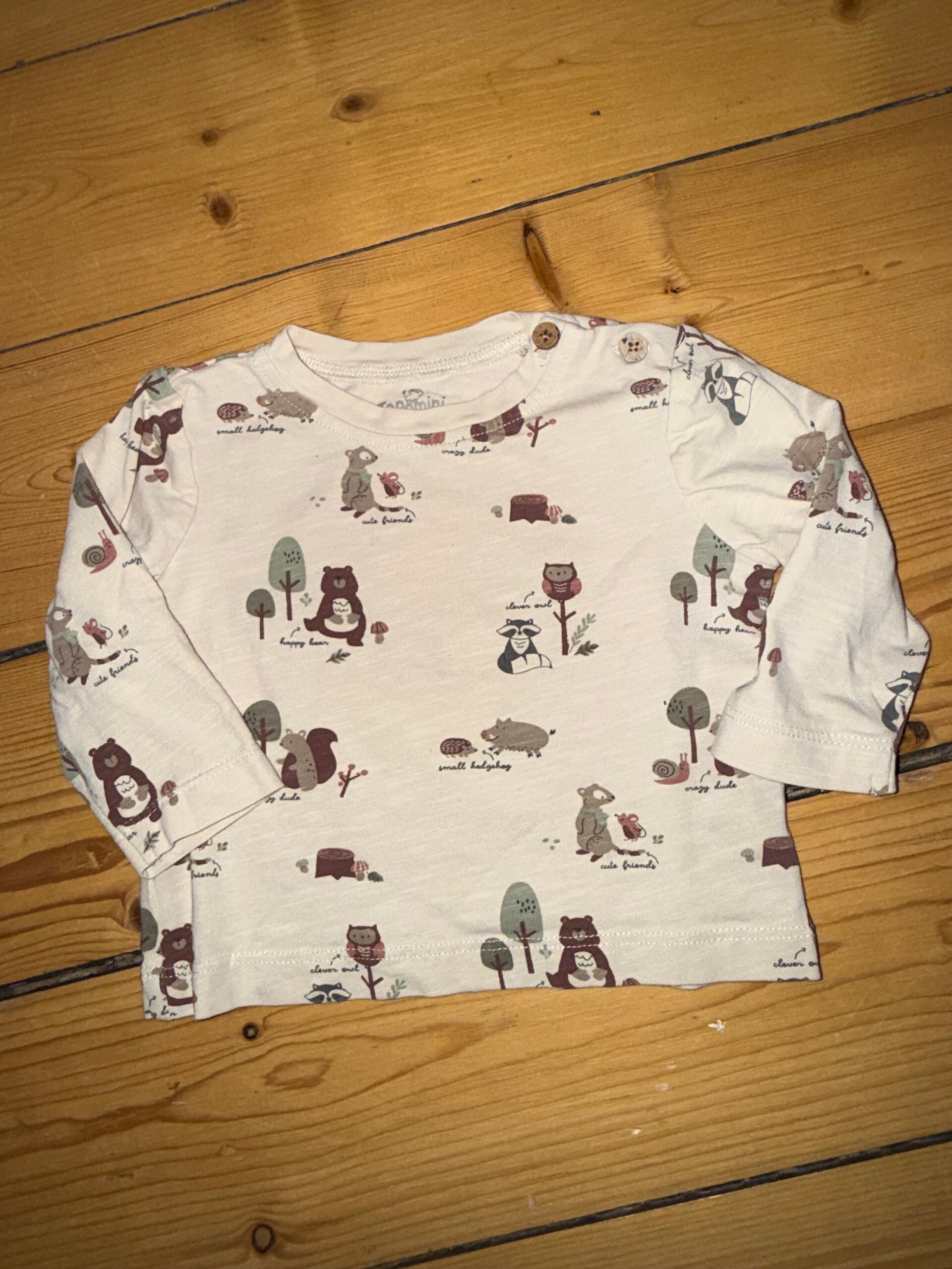 Beiges Langarmshirt mit Tieren Gr. 56 Topomini