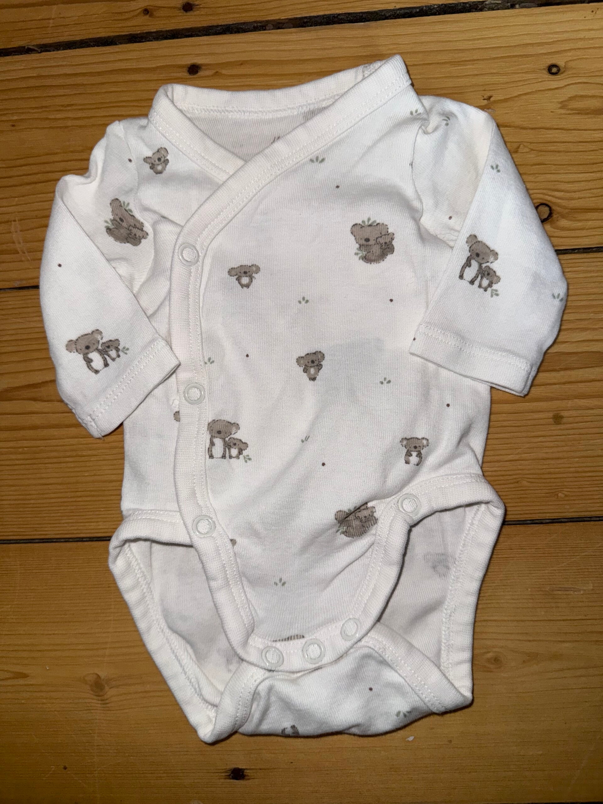 Weißer Wickelbody mit Koala Gr. 50 H&M