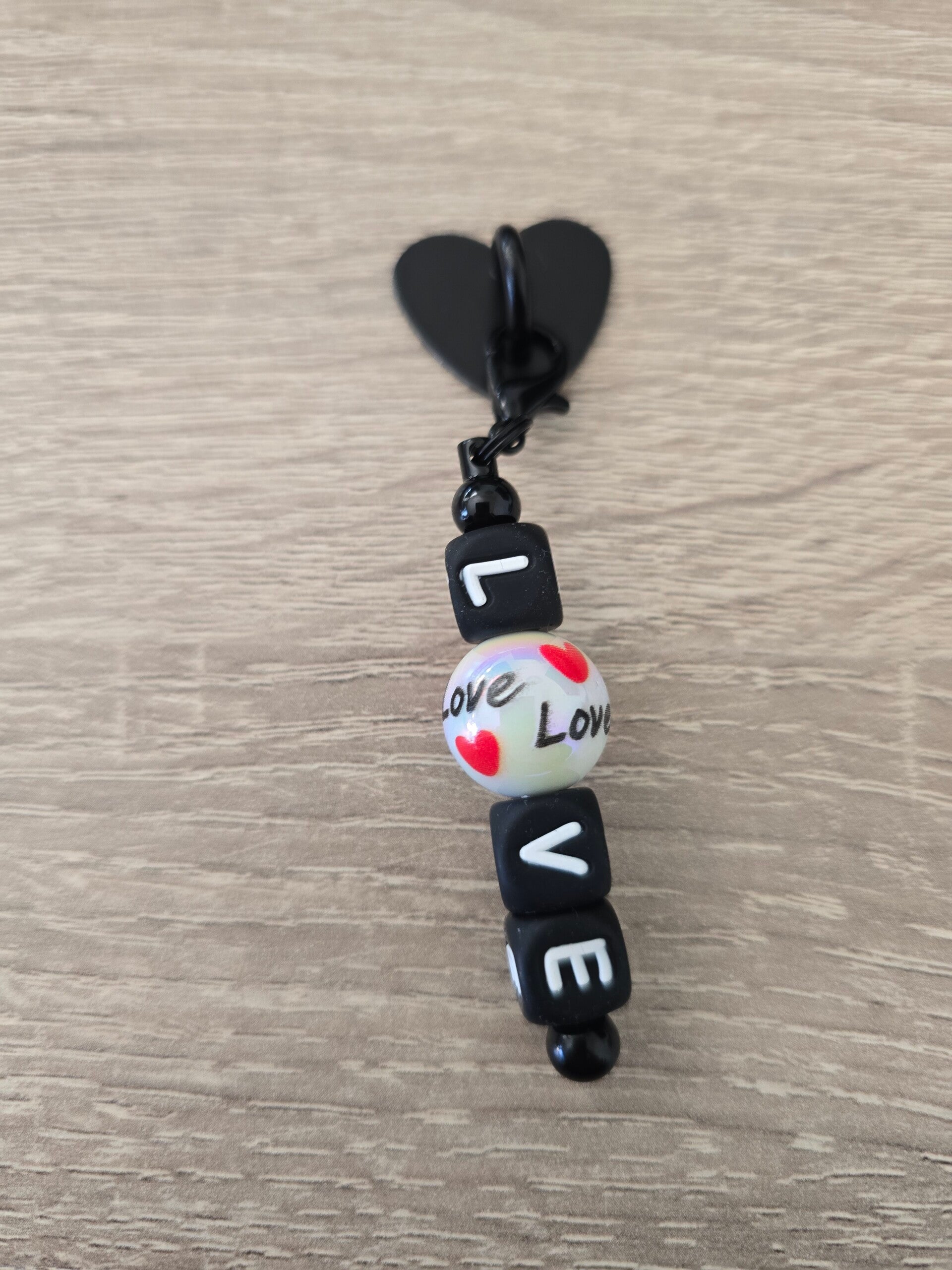 Telefoonhanger love zwart