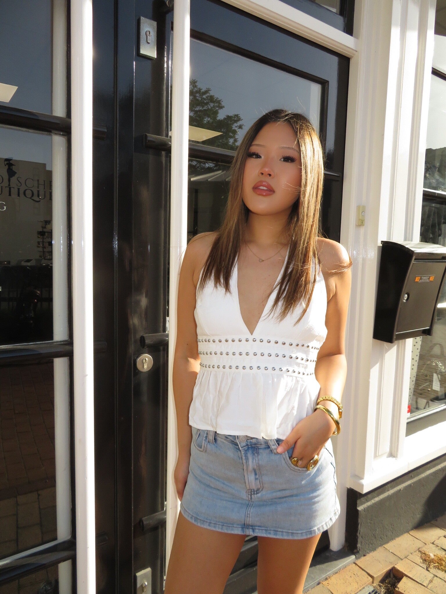 Studded halter open back top
