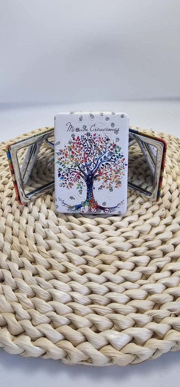 Espejo de bolso dos caras una con aumento y otra normal