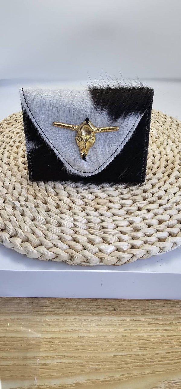 Monedero tipo tarjetero en piel con detalle de búfalo