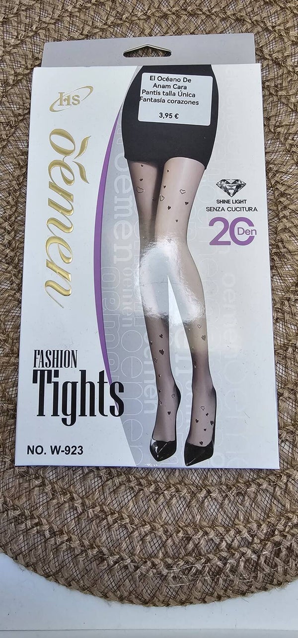 Panty fantasía en negro transparentes y estampado de corazones