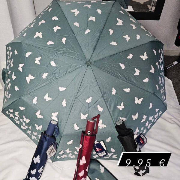 Paraguas plegable para bolso con estampado de mariposas.