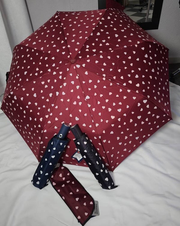Paraguas plegable para bolso con estampado de corazones
