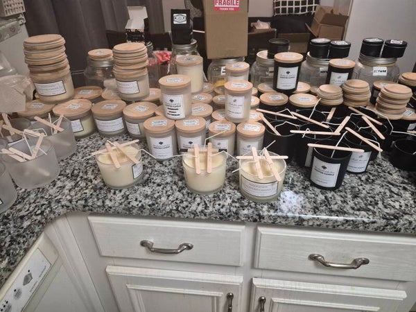 Coming Soon 100% yellow beeswax soywax candles in glass jars and tin jars with lids.