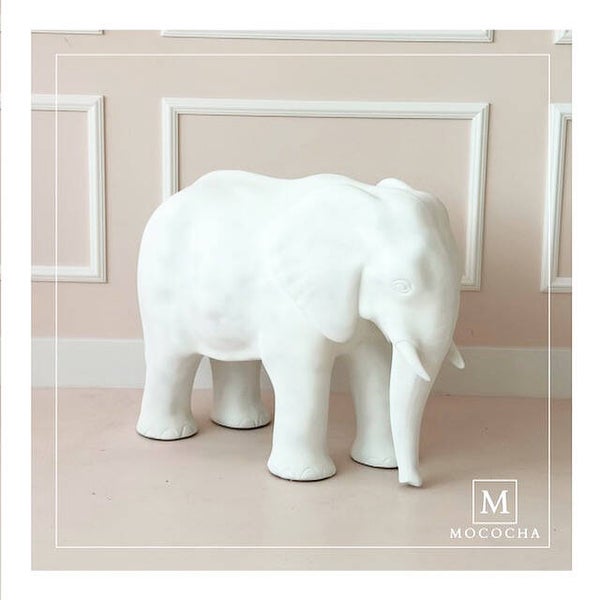 Witte olifant 60 cm hoog ( polyester)
