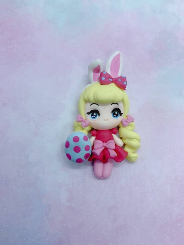 Easter girl rabbit with blue egg