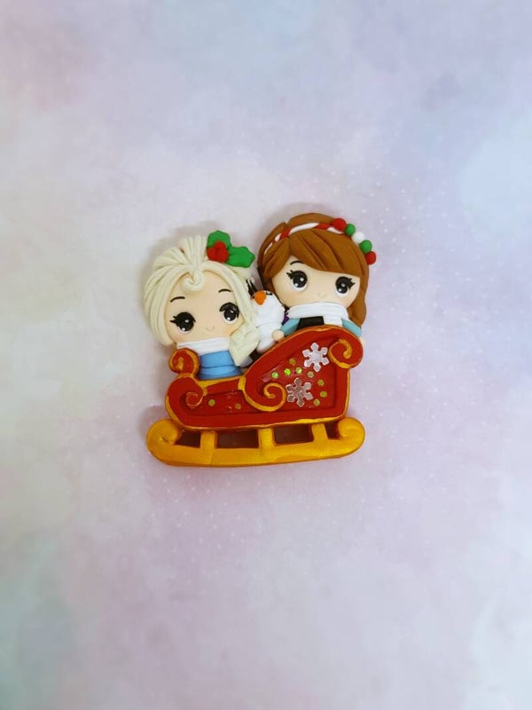 Sisters on sleigh