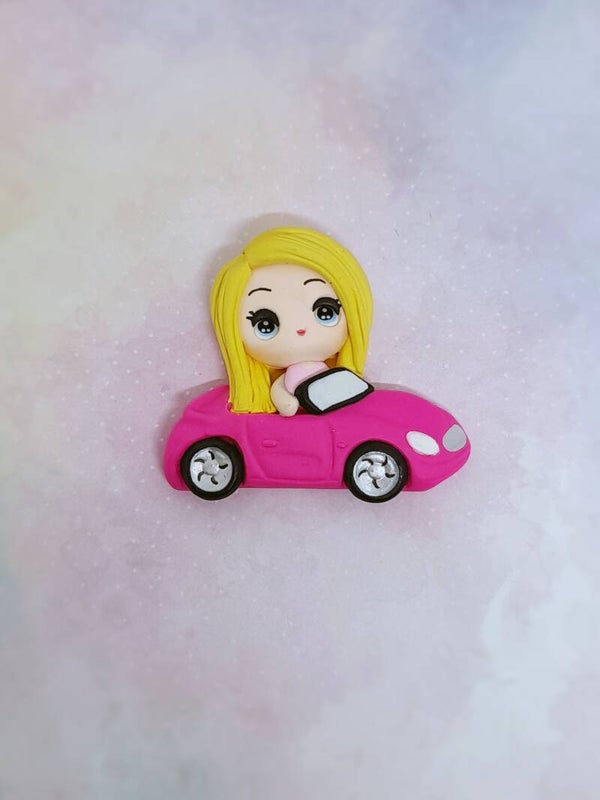 Barbie on car
