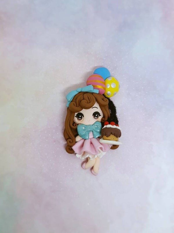 Girl with tart and ballon