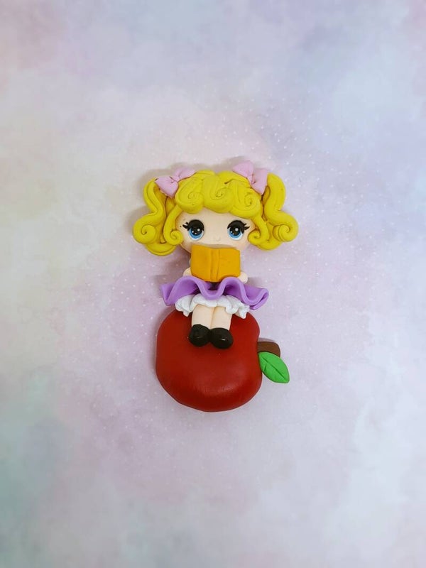 Apple girl blond hair