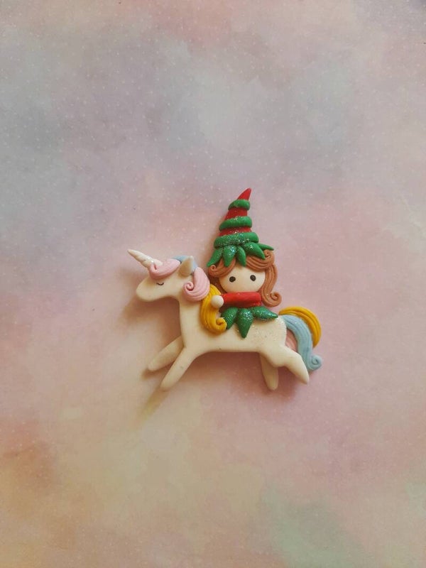 Kerst jongen op unicorn