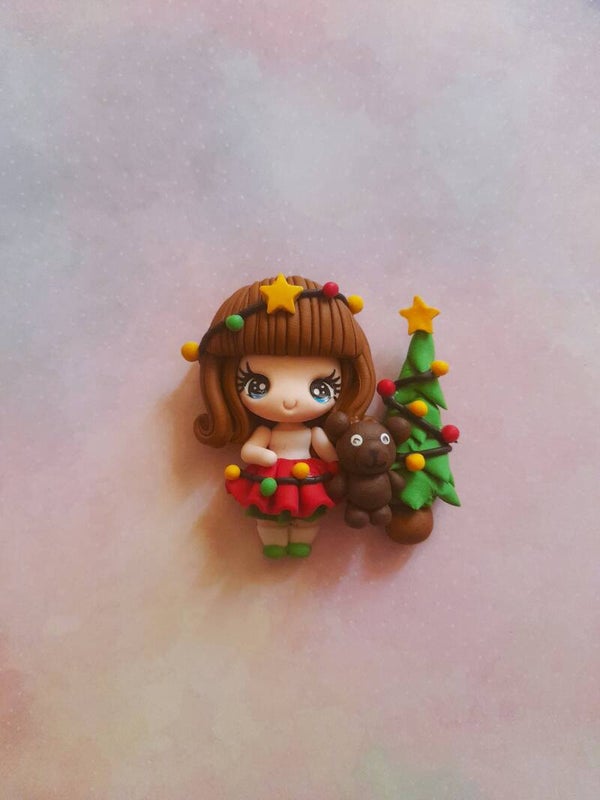 Meisje met kerstboom