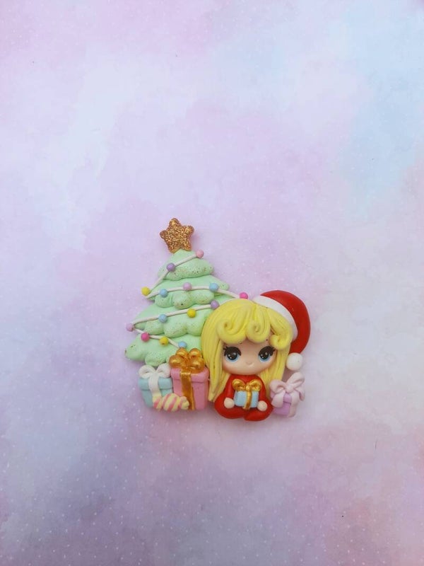 Girl with christmas tree blond hair