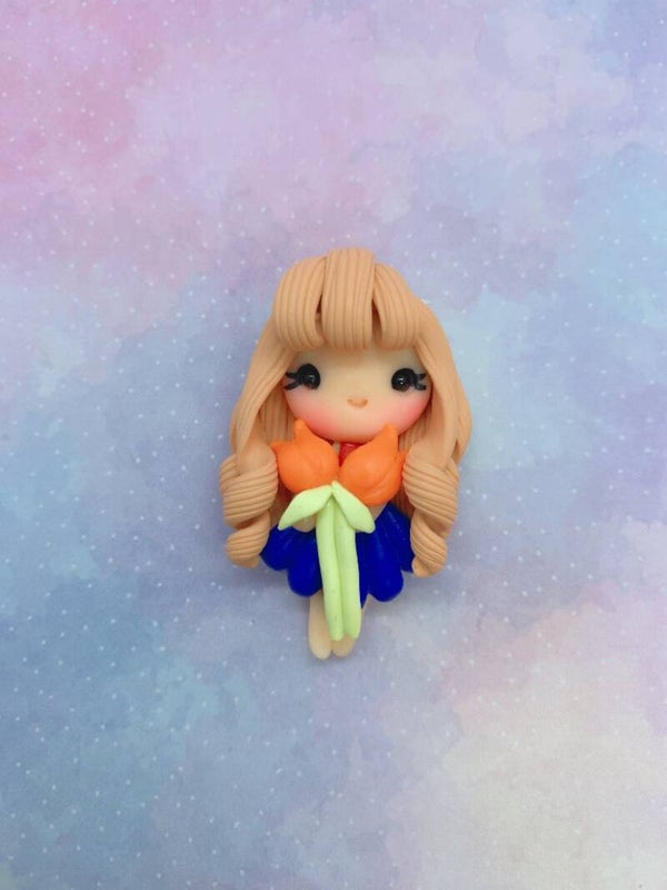 Koningsdag meisje met oranje tulpen