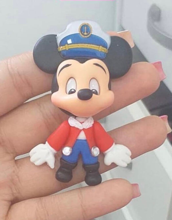 Sailor man with boat on hand