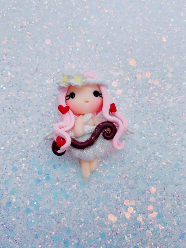 Cupido roze haar