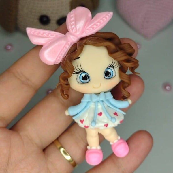 Girl with pink bow