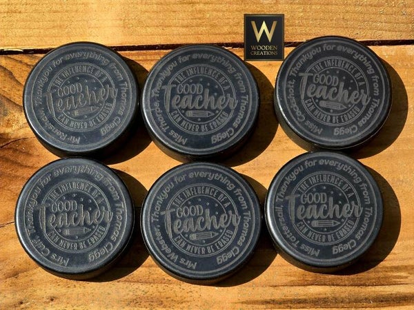 Engraved teacher pucks