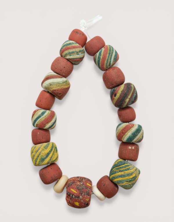 Antique Indo-Pacific beads (barter money) from Indonesia (700-1200 AD)