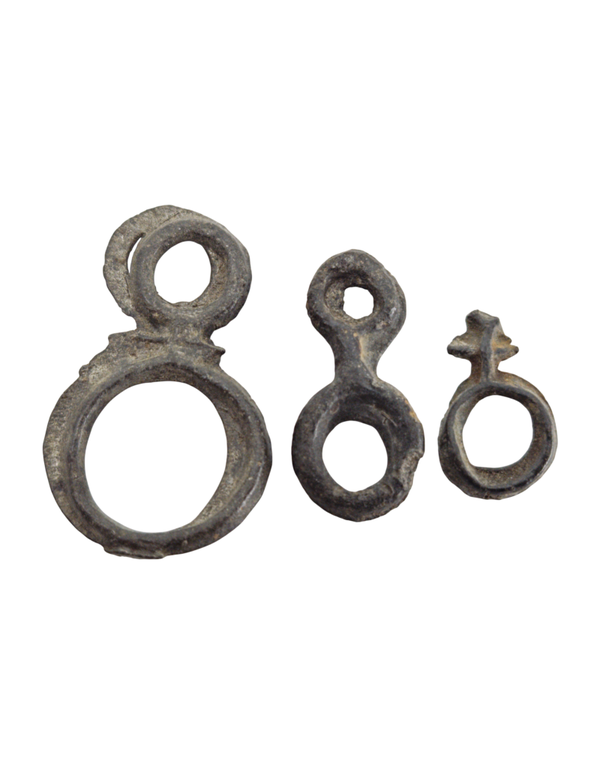 A fascinating trio of primitive Tin "Ring Money" from the Indonesian Archipelago (Majapahit to Sultanate periods, 14th - 17th Century)., itemnumber: W5146