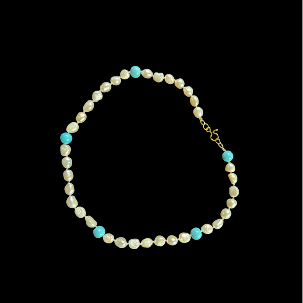 Geknoopte zoetwaterparel en turkoois ketting