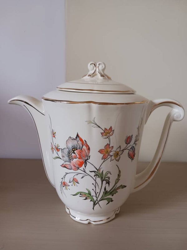 Cafetière ou théière en faïence .