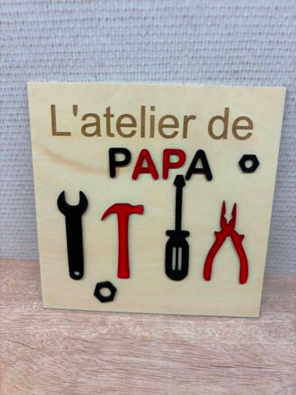 Cadre L'atelier de papa avec des outils