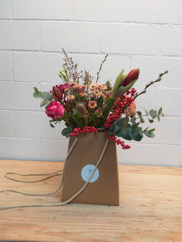 Medium kerstboeket in flowerbag