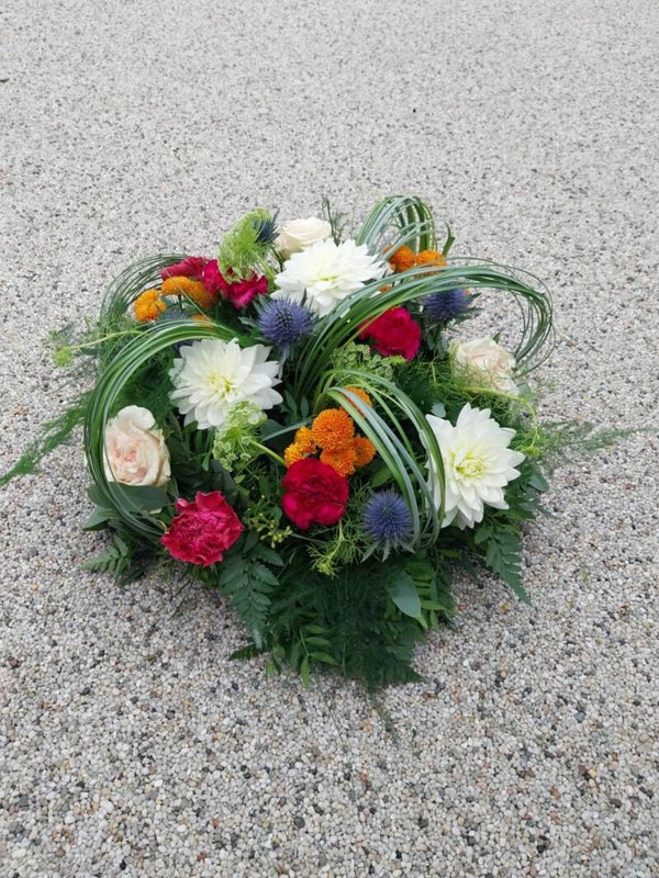 rond bloemstuk met grassen