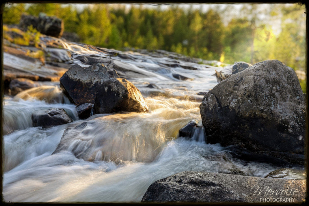 Landscape photography at Storforsen, Sweden, using long exposure to create silky water on a summer day.