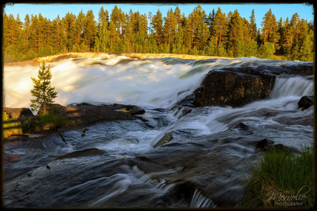 Landscape photography at Storforsen, Sweden, using long exposure to create silky water on a summer day.