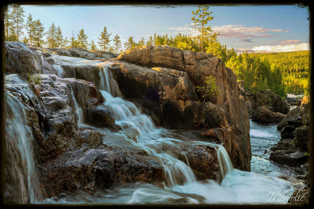 Landscape photography at Storforsen, Sweden, using long exposure to create silky water on a summer day.