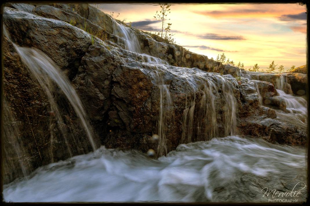 Landscape photography at Storforsen, Sweden, using long exposure to create silky water on a summer day.