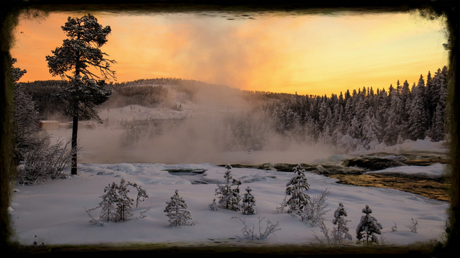 he powerful Storforsen rapids rushing over dark, ice-covered rocks during a winter sunset in Norrbotten, Sweden.