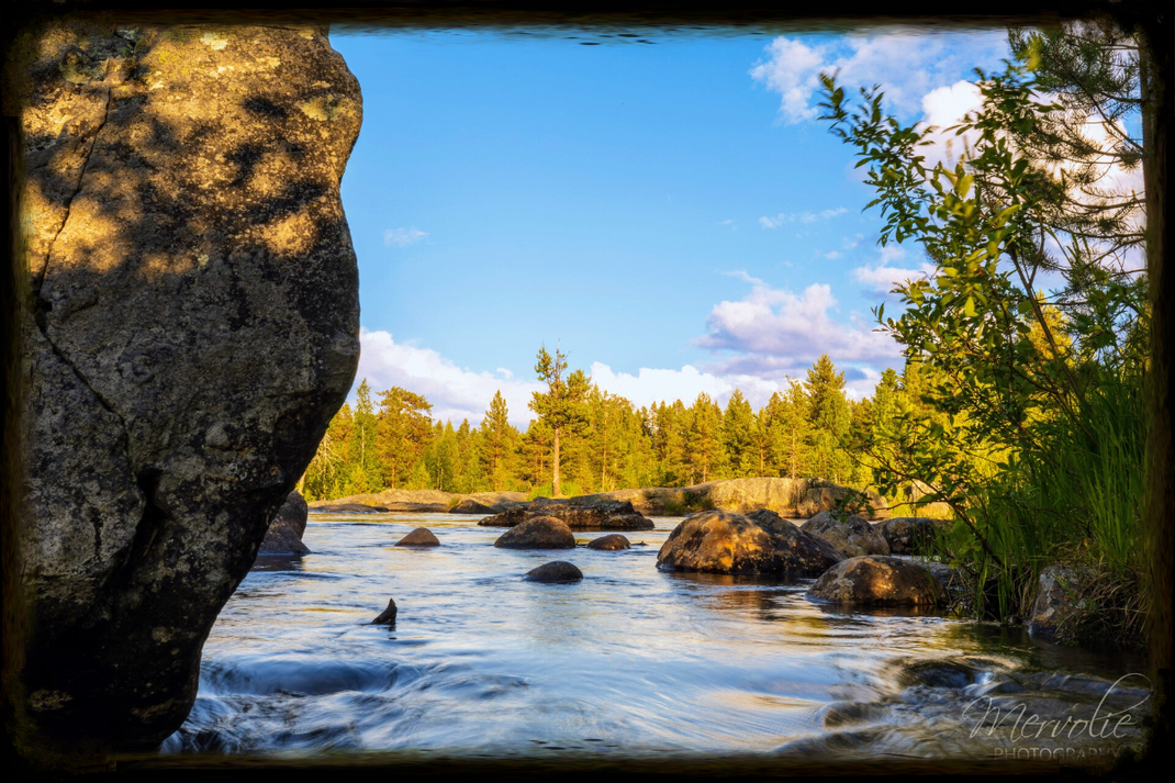 Landscape photography at Storforsen, Sweden, using long exposure to create silky water on a summer day.