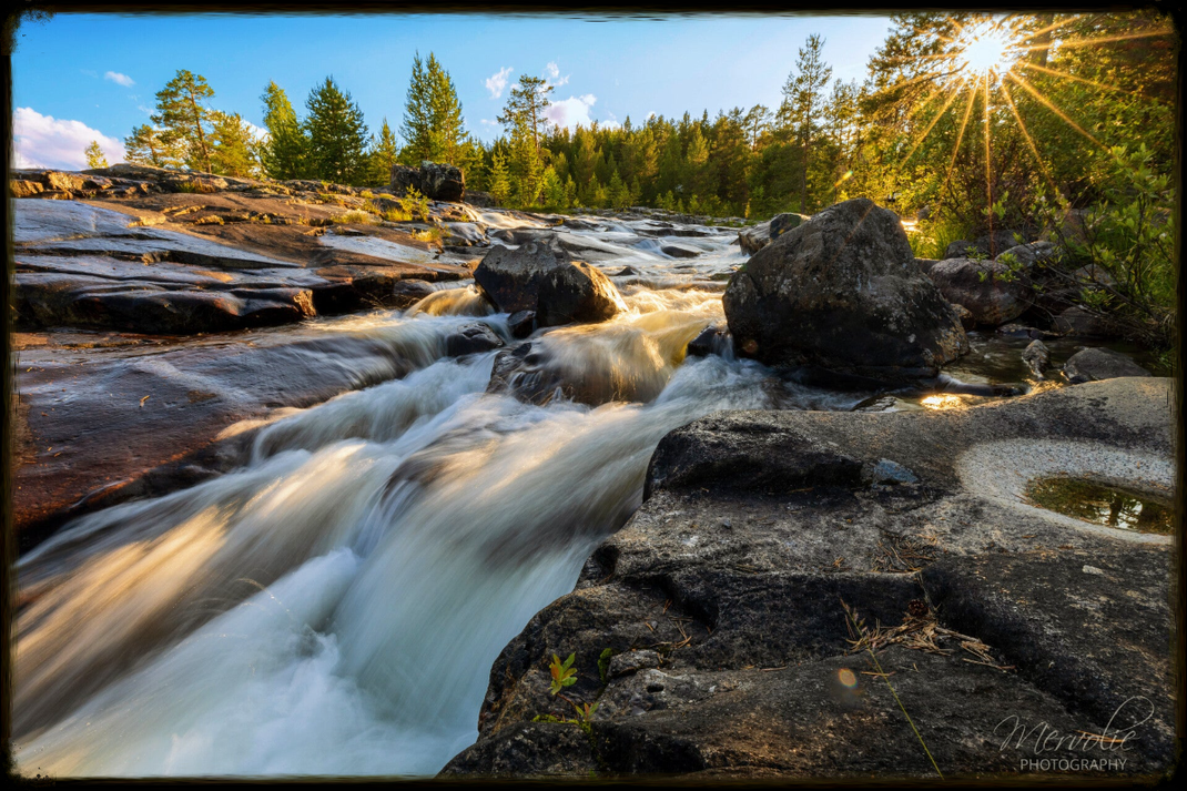 Landscape photography at Storforsen, Sweden, using long exposure to create silky water on a summer day.