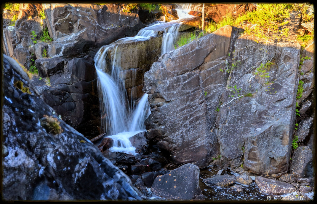 Landscape photography at Storforsen, Sweden, using long exposure to create silky water on a summer day.